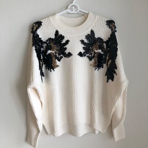 Beautifully designed sweater top!